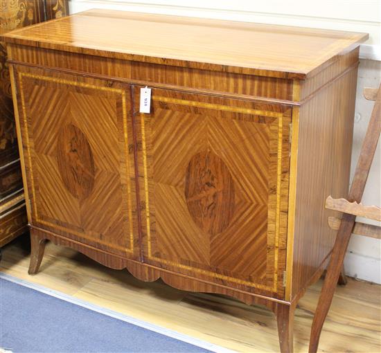 A George III style satinwood and rosewood bowfront side cabinet, W.108cm, D.55cm H.91.5cm